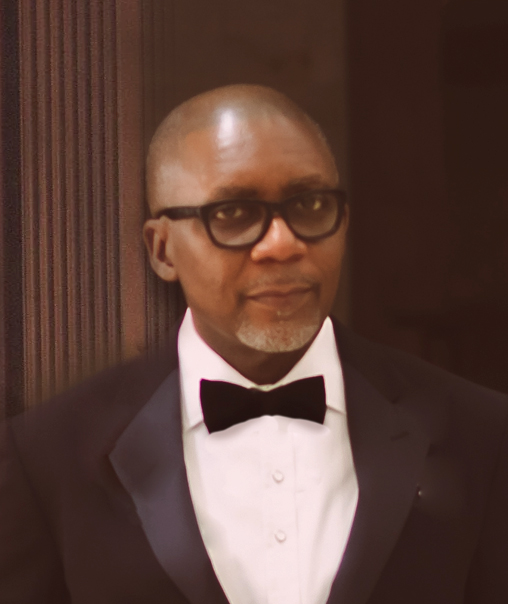 Professional portrait of Tunde Akinyele